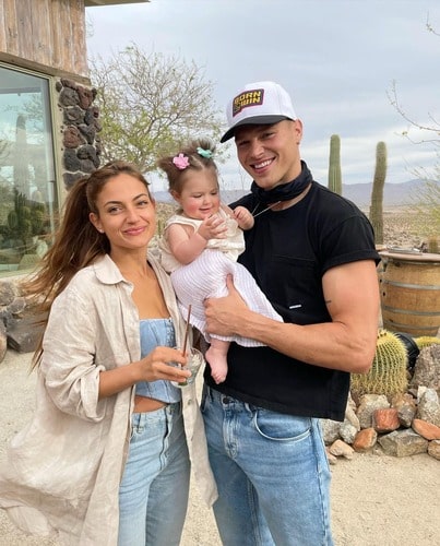 Matthew Noszka, his wife Inanna Sarkis and their child Nova Noszka
